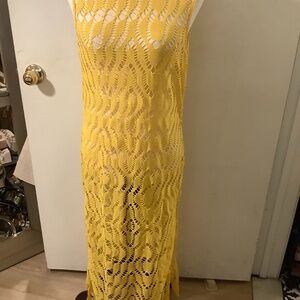 St.Tropez yellow sleeveless, crochet maxi dress with deep U back and side slits.